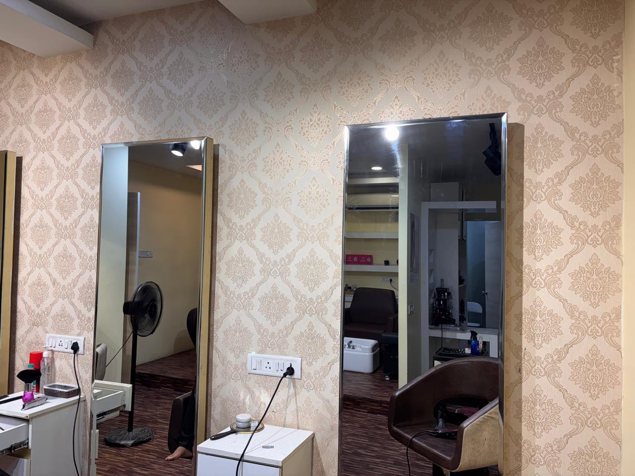 Styling mirrors and chairs inside GLAM salon